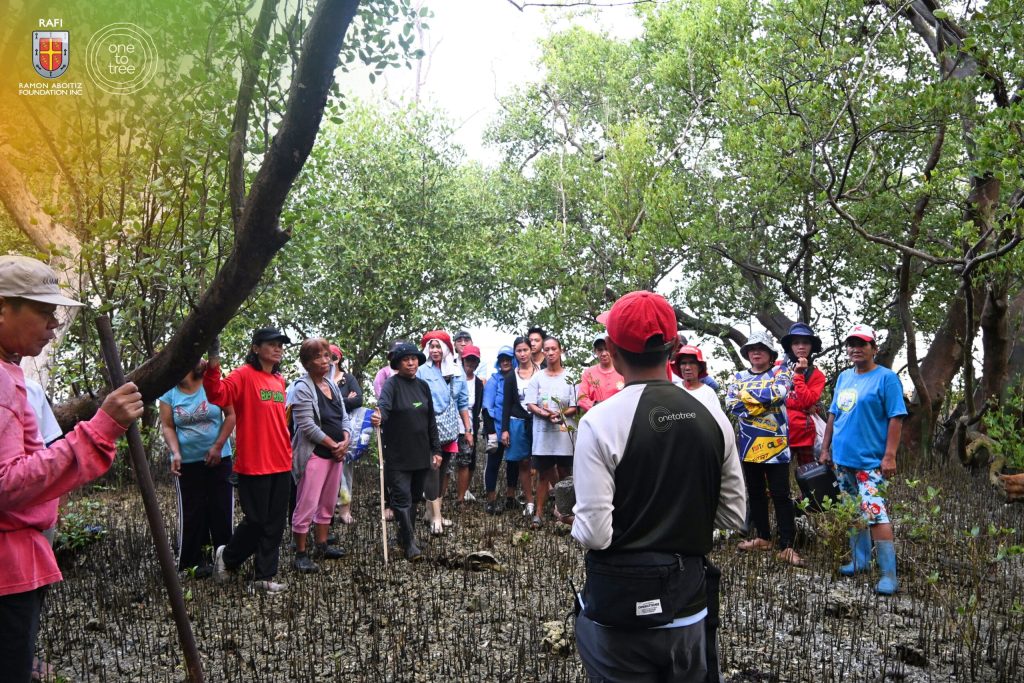 Community gathering for Environmental Stewardship and mangrove conservation.